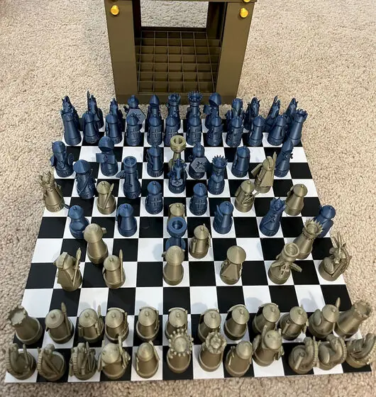 Gold against deep blue, drawn up and ready for the first move.