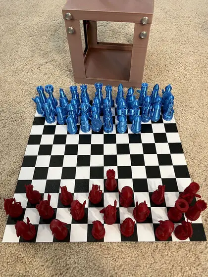 The bright blue and red armies take the field in front of their rose box.