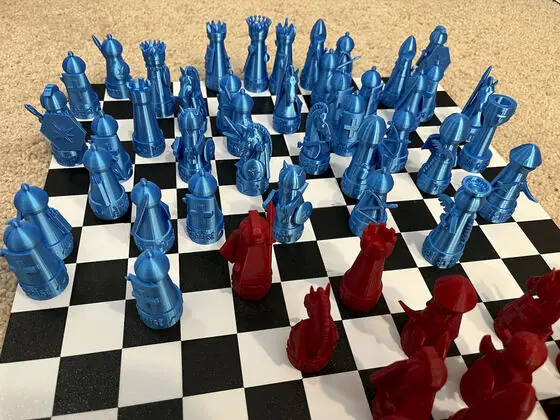 The bright blue army advances on red, standards raised.