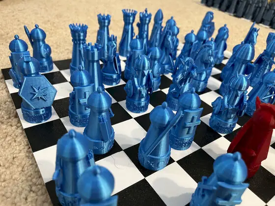 The star standard rises over the blue ranks — one red scout slipped in between.